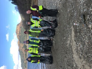 Some of the many volunteers with piles of litter they collected from the shoreline of Loch Lubnaig.