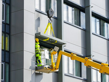 Cladding being removed for Fire barrier installation