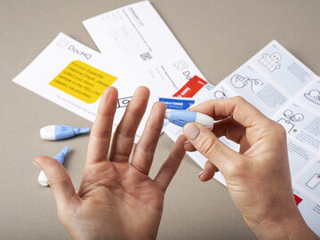 Taking a finger-prick blood sample for home health test