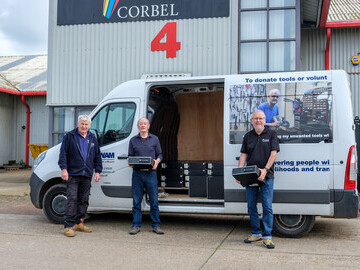 Tim, John, and Graham loading the donated computers into TWAM