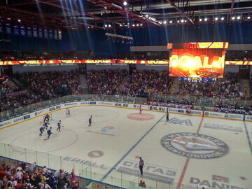 New center-hung videoboard accentuated by an LED ribbon board at Metallurg Arena, Magnitogorsk