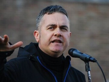 Dominic Dyer speaking at a badger cull protest for Care for the Wild