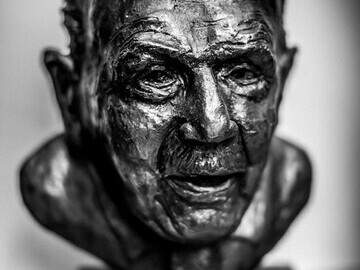 • The bust of Captain Sir Tom Moore cast in bronze resin and donated by West Cornwall artist Penny Lally. 