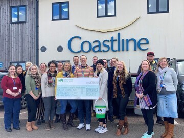 Colleagues at Coastline gather to present Children’s Hospice South West with over £12,400 thanks to their fundraising efforts over the past year