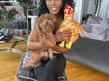 Sinitta with her dog Scarlett and Beatrice the hen mascot