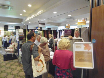Visitors browse the exhibition at The Cambridge Belfry Q Hotel