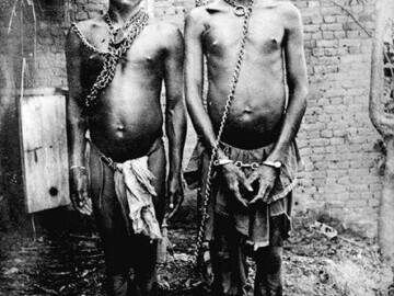 Alice Seeley Harris, Manacled members of a chain gang at Bauliri. A common punishment for not paying taxes, Congo Free State, c. 1904. Courtesy Anti-Slavery International/Autograph ABP