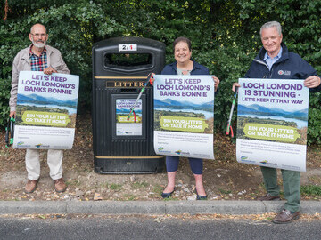 Pictured beside one of the large pilot litter bins are (left to right) John Urquhart, Vice Chair of the Friends; Jackie Baillie MSP and Sir Malcolm Co