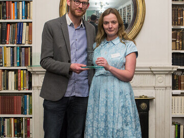 WVS Marketing Manager Emma Harrison being presented the Charity Website of the Year Award by judge Ciaron Dunne