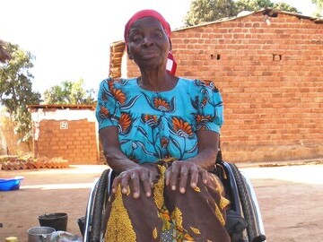 Etta, 86, Malawi in her Motivation wheelchair