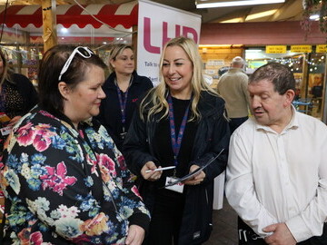 LHP Income Team Leader Nicola Leach (centre) advises customers as part of Talk Money Week