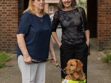 Trustee Lynda Rhodes (L) and Sense Ability Matters CEO Sarah French (R) with guide dog Taggart
