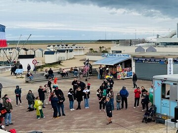 Visitors to historic Sword Beach in Normandy enjoy fish and chips ahead of the D-Day 80 commemorations