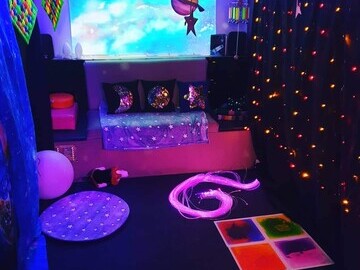 Inside the Linkage Sensory Bus, while set up with a space theme. – Image ‘03 Linkage.jpg’