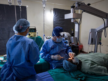 Dr Sanduk Ruit performs surgery to cure a patient of cataract blindness.