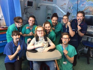 05. Maisie with her care team at Addenbrooke