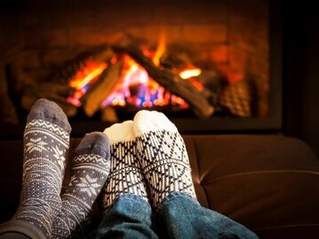 Couple at a festive fireplace