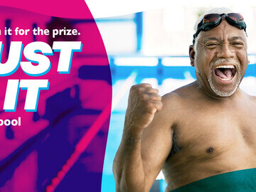 Ad for the Aspire Channel Swim with man in pool with fists up