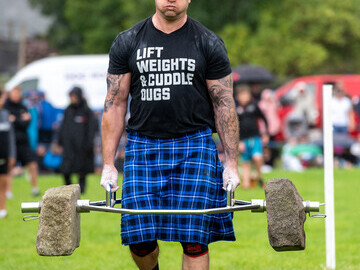 Athlete competing in the Stirling Stones competition at Stirling Highland Games 2023