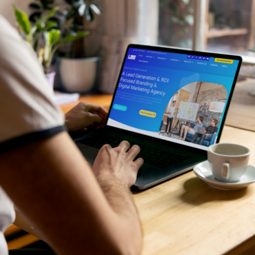 Owner scrolling on Lobo Digital website