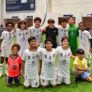 Kids at the football field, group photo