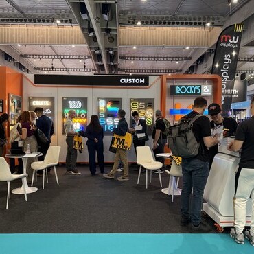 Wide-angle view of LC Sign exhibition booth at FESPA 2026, featuring LED signage displays and live product demonstrations.