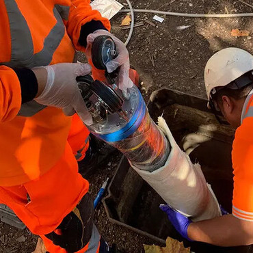 Image of Drain 247 engineers carrying out drain repairs via no-dig technology.