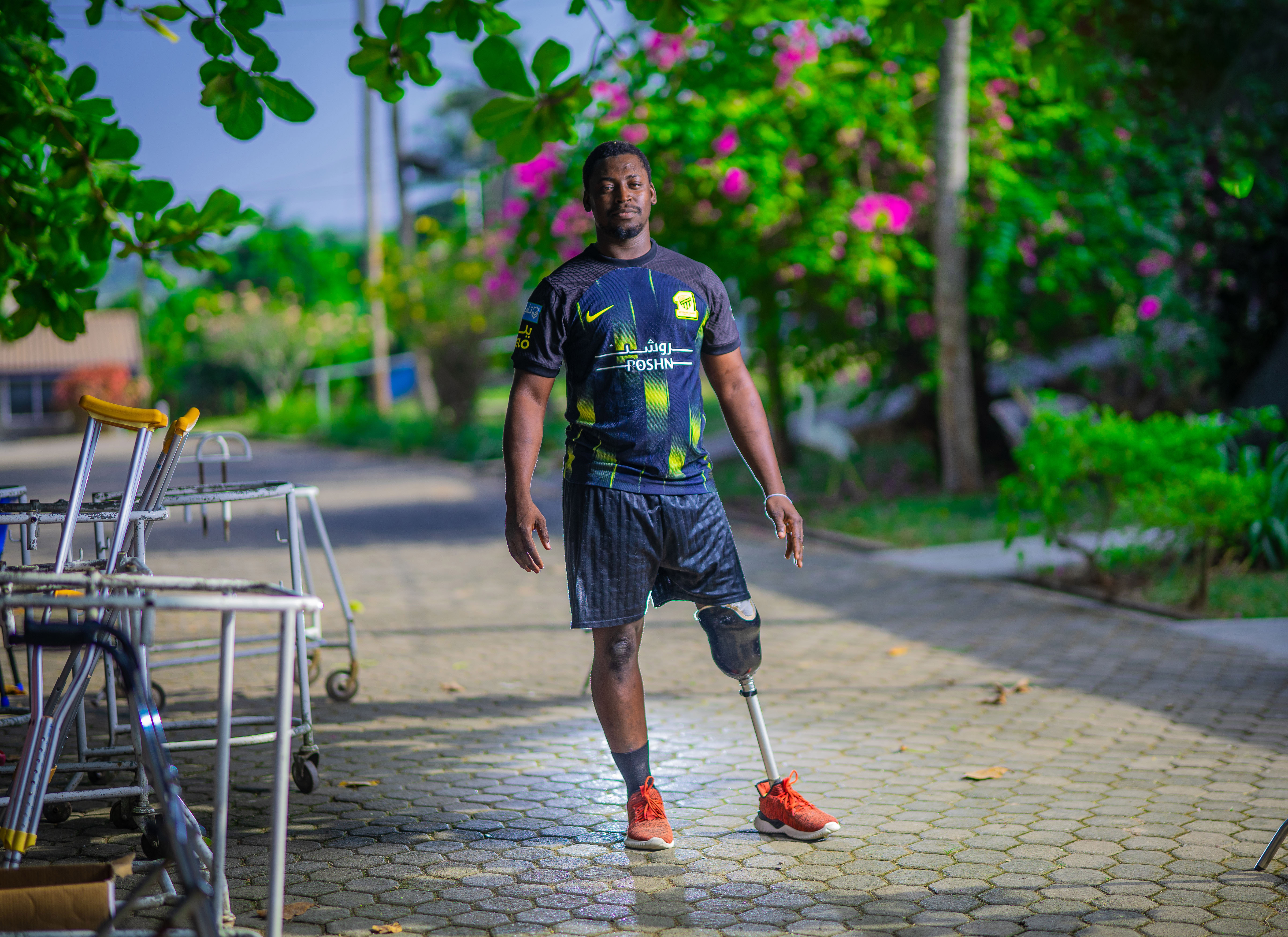 Isaac from Ghana, with a donated leg from STAND.