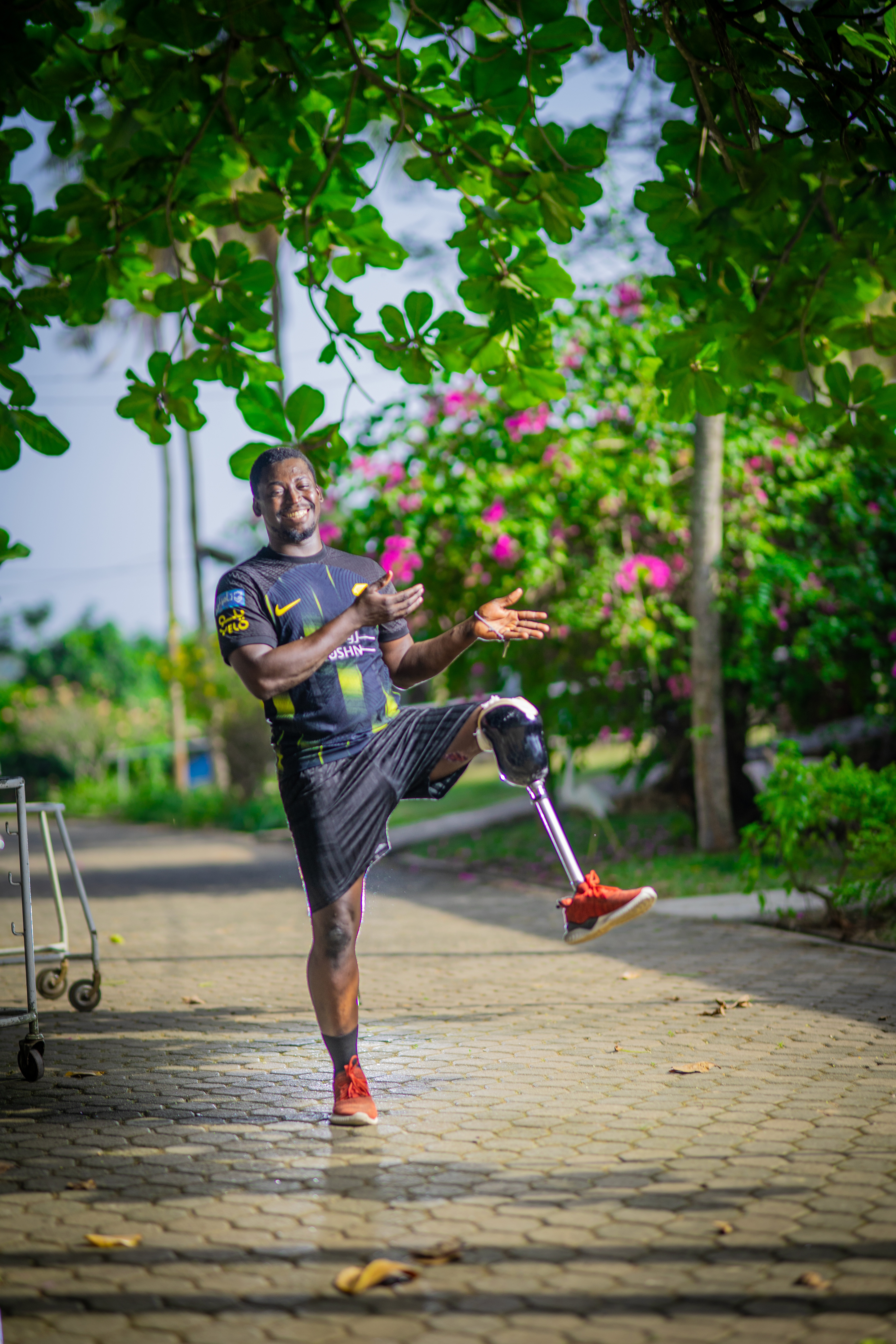 Isaac from Ghana, with a donated leg from STAND.
